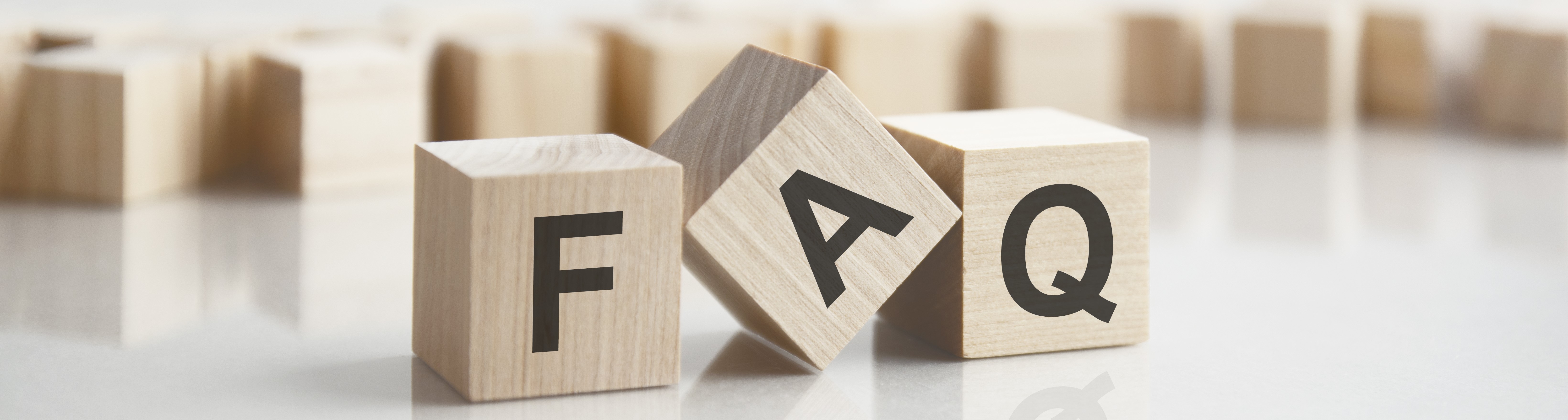 FAQ Textbild aus drei Würfeln